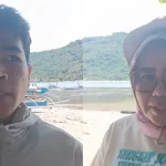 Adrianus Malintoi dari Rare Indonesia (kiri), dan Sangadi Desa Molobog, Sandra Dewi Tololiu (kanan) dalam patroli laut di Jiko, Boltim.(Foto: RARE Indonesia)