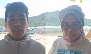 Adrianus Malintoi dari Rare Indonesia (kiri), dan Sangadi Desa Molobog, Sandra Dewi Tololiu (kanan) dalam patroli laut di Jiko, Boltim.(Foto: RARE Indonesia) Adrianus Malintoi dari Rare Indonesia (kiri), dan Sangadi Desa Molobog, Sandra Dewi Tololiu (kanan) dalam patroli laut di Jiko, Boltim.(Foto: RARE Indonesia)
