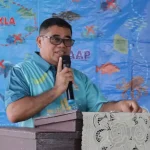 Plt Bupati Kepulauan SITARO Bapak Heronimus Makainas, menyampaikan sambutan dan membuka kegiatan Bakti Sosial dan Sosialisasi PAAP, Kamis (28/5/2026).(Foto: dok. RARE Indonesia)