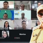 Kepala Bagian Pemerintahan Setda Minahasa Utara, Sefferson Sumampouw, mengikuti rapat daring tindak lanjut program Official Development Assistance (ODA). Insert: Bupati Minut, Joune Ganda.