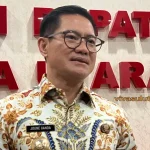 Bupati Minahasa Utara, DR Joune Ganda.